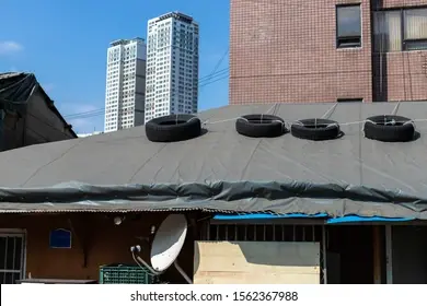 Why Do People Put Car Tires on Their Roof? (Details Here)